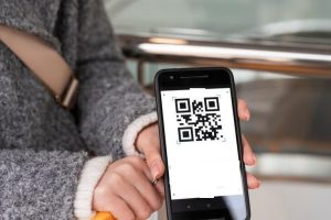 high-angle-hand-holding-smartphone_23-2149340918 (1)