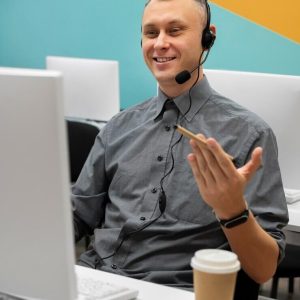 man-working-call-center-with-headphones-computer_23-2149256074 (1)